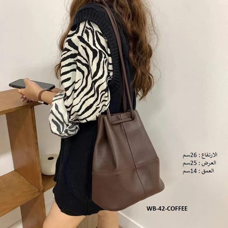حقيبة نسائية جلد ابيض