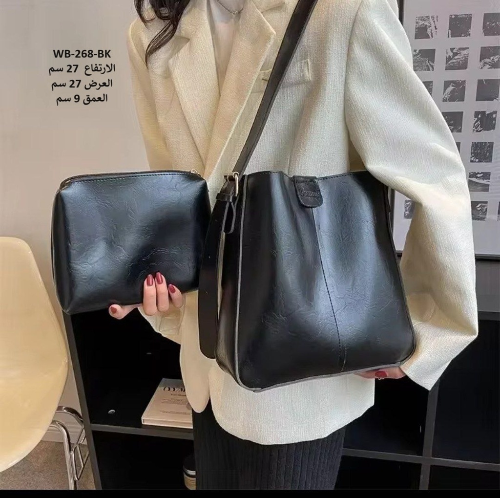 حقيبة نسائية  جلد اسود
