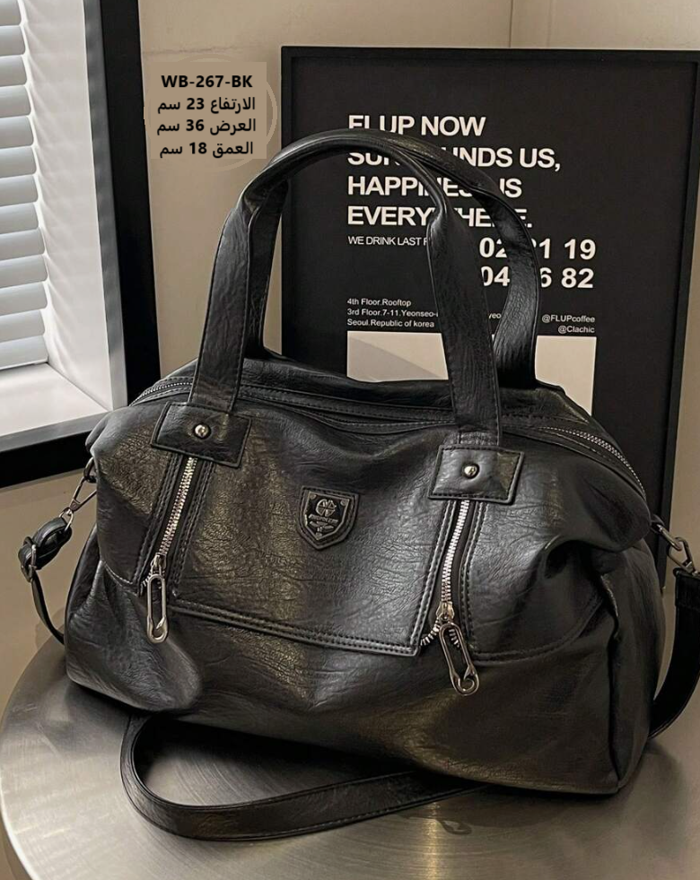 حقيبة نسائية جلد اسود 